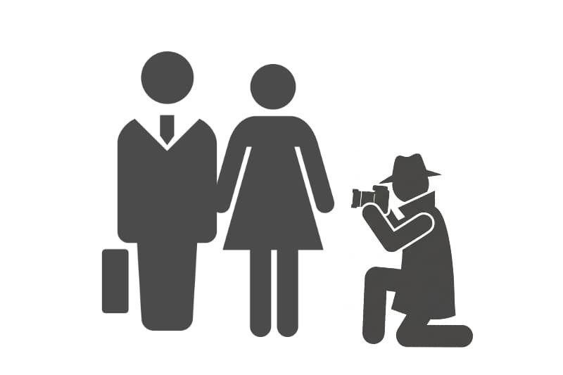 男女の社内関係を調査員が撮影しているアイコンで、社内不倫調査・社内恋愛トラブル調査・ハラスメント調査・就業規則違反調査など、職場で起きる不倫やトラブルの事実確認に対応する企業向け調査サービスを象徴した画像。
